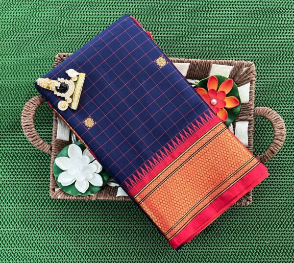 A luxurious Kanjivaram silk saree with intricate checks and butta designs in vibrant colors