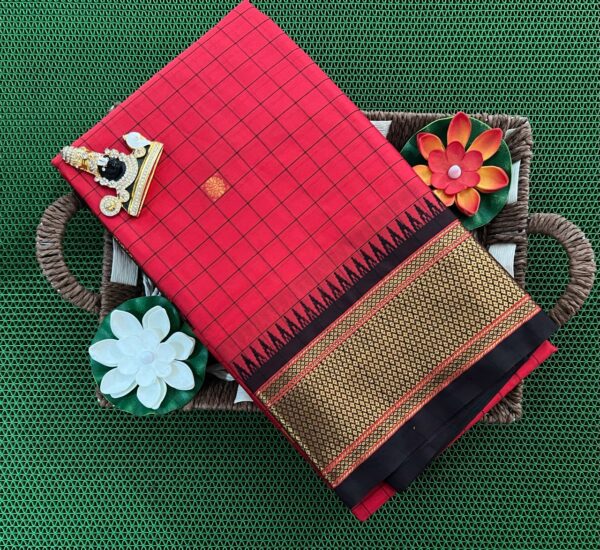 A luxurious Kanjivaram silk saree with intricate checks and butta designs in vibrant colors