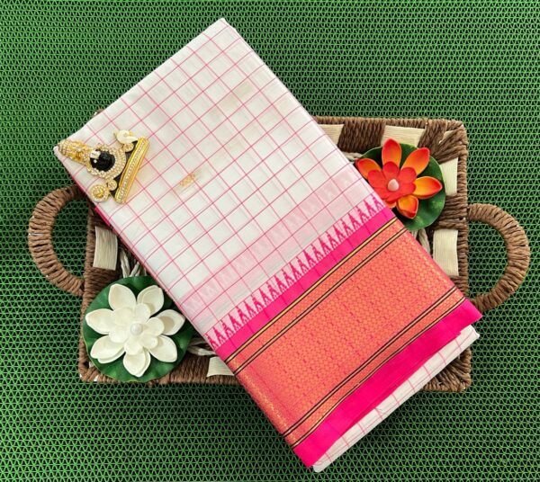 A luxurious Kanjivaram silk saree with intricate checks and butta designs in vibrant colors