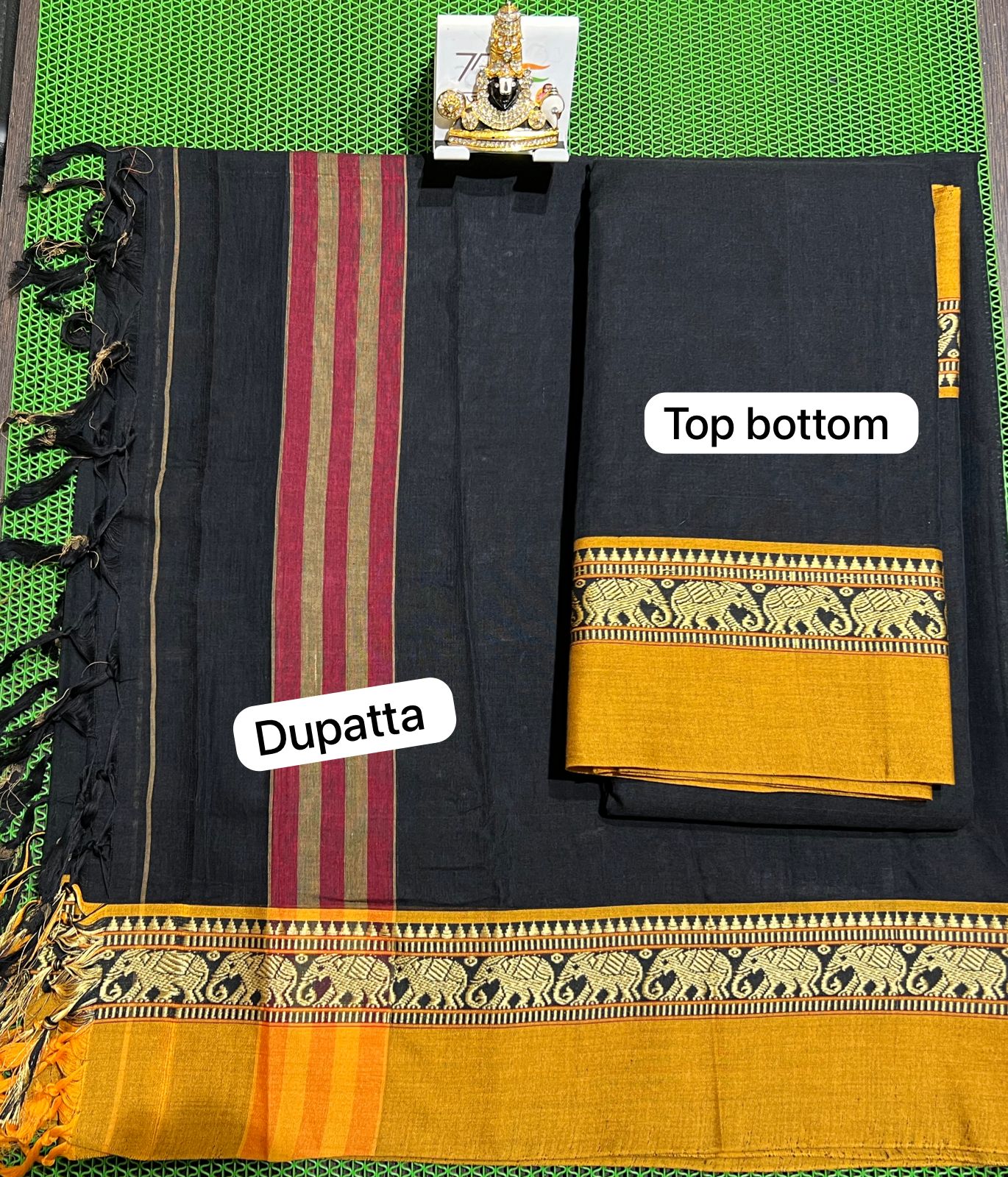 narayanpet sarees A beautiful Narayanpet half saree with intricate weaving patterns and vibrant colors.