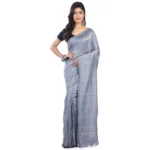 Woman wearing a plain saree grey COLOUR