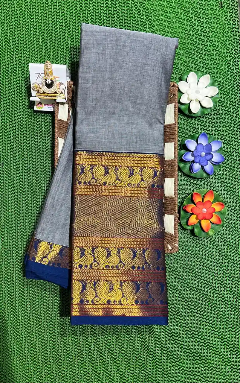 narayanpet sarees Traditional narayanpet sarees featuring a grey base, blue and gold zari, and peacock motifs.