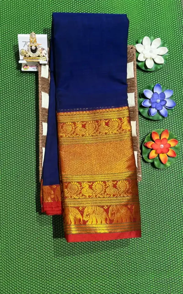 A rich blue Narayanpet sarees with a thick, golden border featuring elephant motifs.
