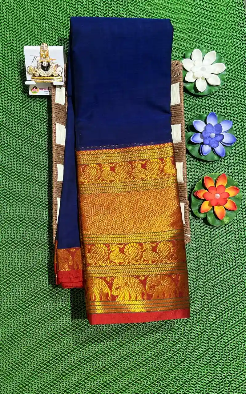 Pure Narayanpet Handwoven Cotton Saree A rich blue Narayanpet sarees with a thick, golden border featuring elephant motifs.