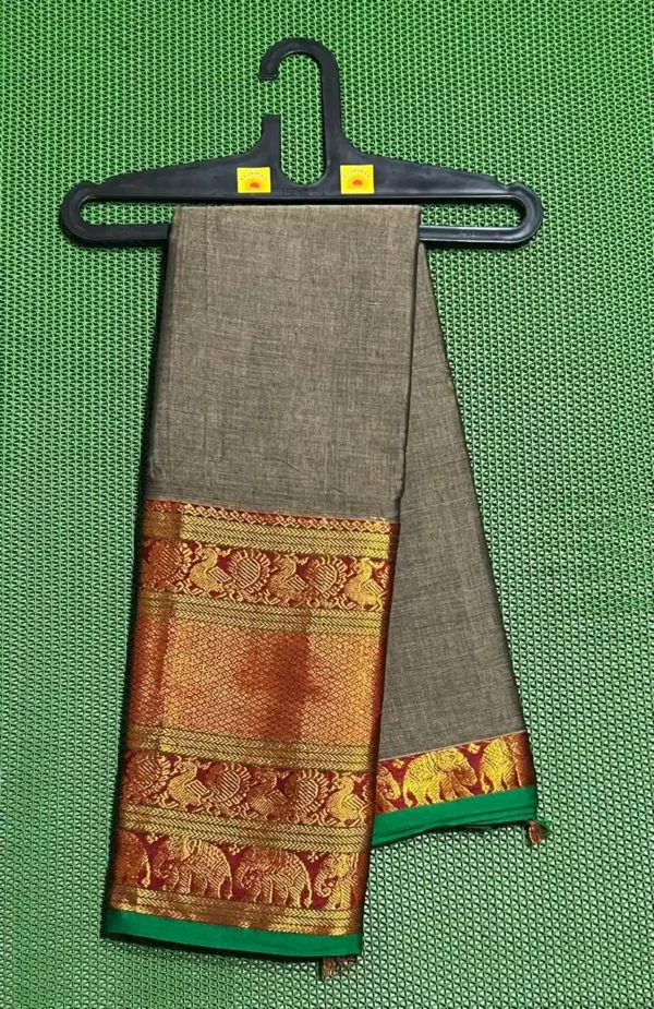 A grey Narayanpet sarees with a thick, golden and red border featuring elephant motifs.