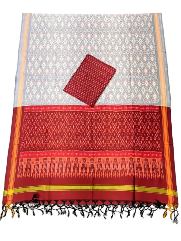 Pochampally Ikat COTTON silk suit with intricate handloom weaving patterns, showcasing traditional geometric designs, bordered with rich detailing.