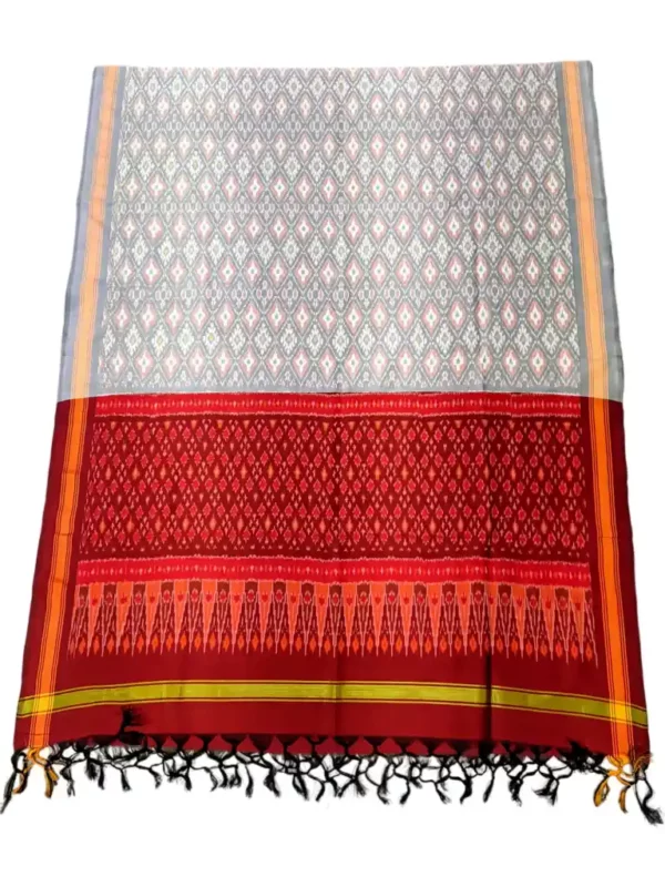 Pochampally Ikat COTTON silk suit with intricate handloom weaving patterns, showcasing traditional geometric designs, bordered with rich detailing.