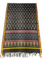 Pochampally Ikat silk suit with intricate handloom weaving patterns, showcasing traditional geometric designs, bordered with rich detailing.