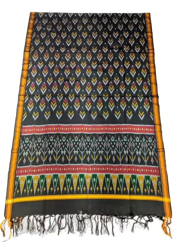 Pochampally Ikat silk suit with intricate handloom weaving patterns, showcasing traditional geometric designs, bordered with rich detailing.