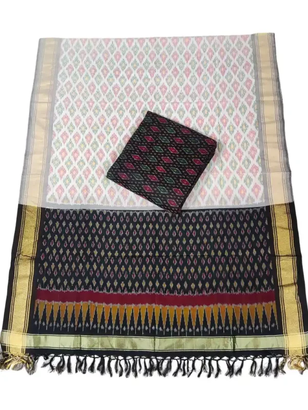 Pochampally Ikat COTTON silk suit with intricate handloom weaving patterns, showcasing traditional geometric designs, bordered with rich detailing.