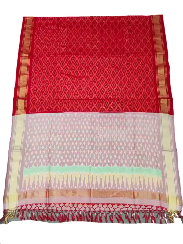 Pochampally Ikat COTTON silk suit with intricate handloom weaving patterns, showcasing traditional geometric designs, bordered with rich detailing.