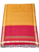 Pochampally Ikat COTTON silk suit with intricate handloom weaving patterns, showcasing traditional geometric designs, bordered with rich detailing.