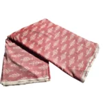 Ikat fabric with classic striped patterns in earthy tones, ideal for modern designs