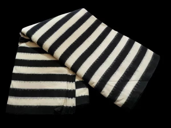 Traditional double ikat fabric showcasing intricate craftsmanship and colorful designs