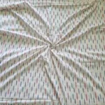 Natural cotton fabric with colorful ikat print