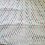 Natural cotton fabric with colorful ikat print