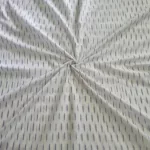 Soft breathable handloom cotton fabric ideal for stitching kurtas, dresses, and shirts – traditional Ikat pattern