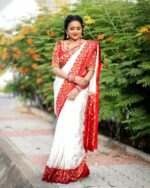 Elegant White Pochampally Silk Saree with Red Ikat Border and Blouse