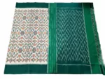 Handwoven green Ikat cotton saree with traditional pattern