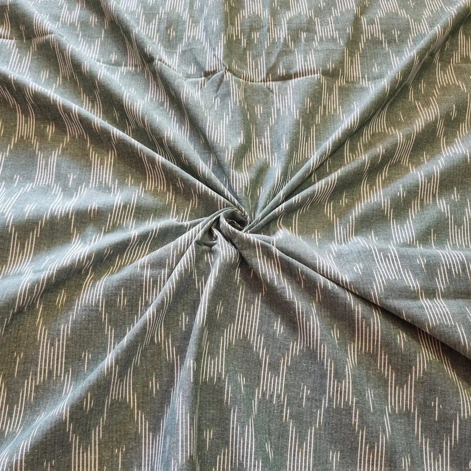 2025/09/1000377533.jpg Pure Cotton Fabric – Handwoven Ikat Design - Image 1